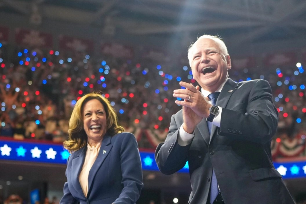 Vice President Harris and Governor Walz clapping and excited in front of large crowd