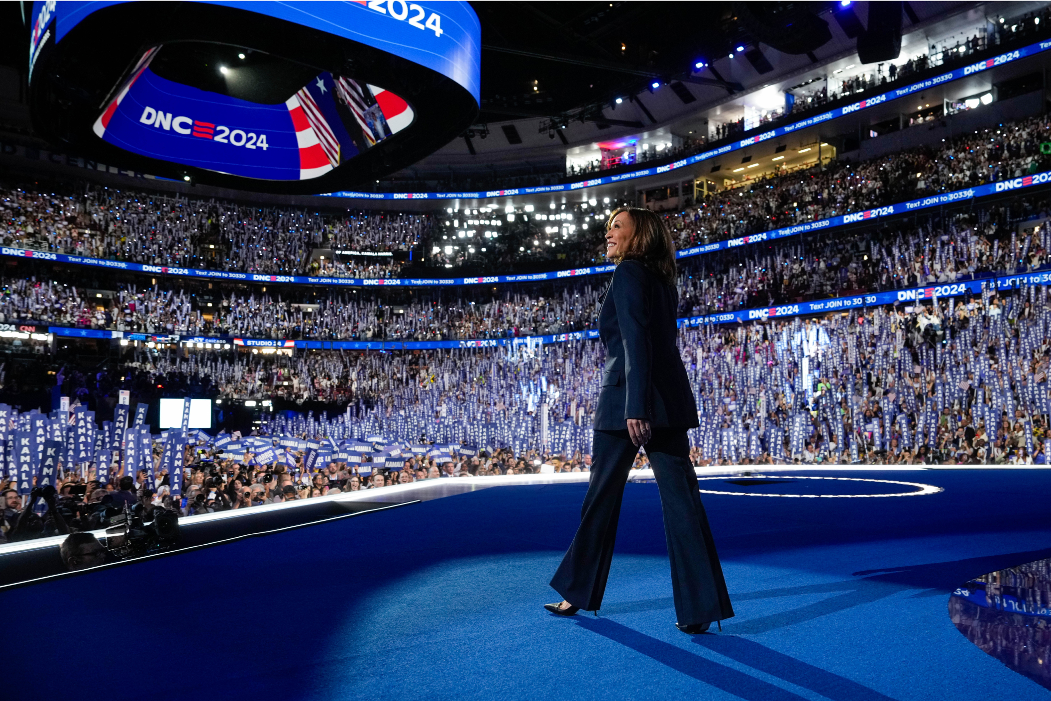 Vice President Harris on stage in front of a large crowd