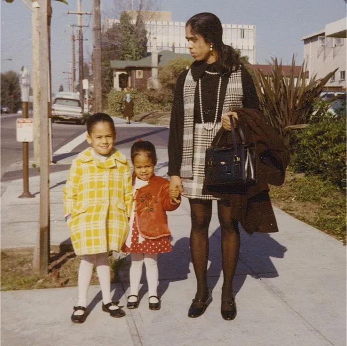 Harris as a child with her mother