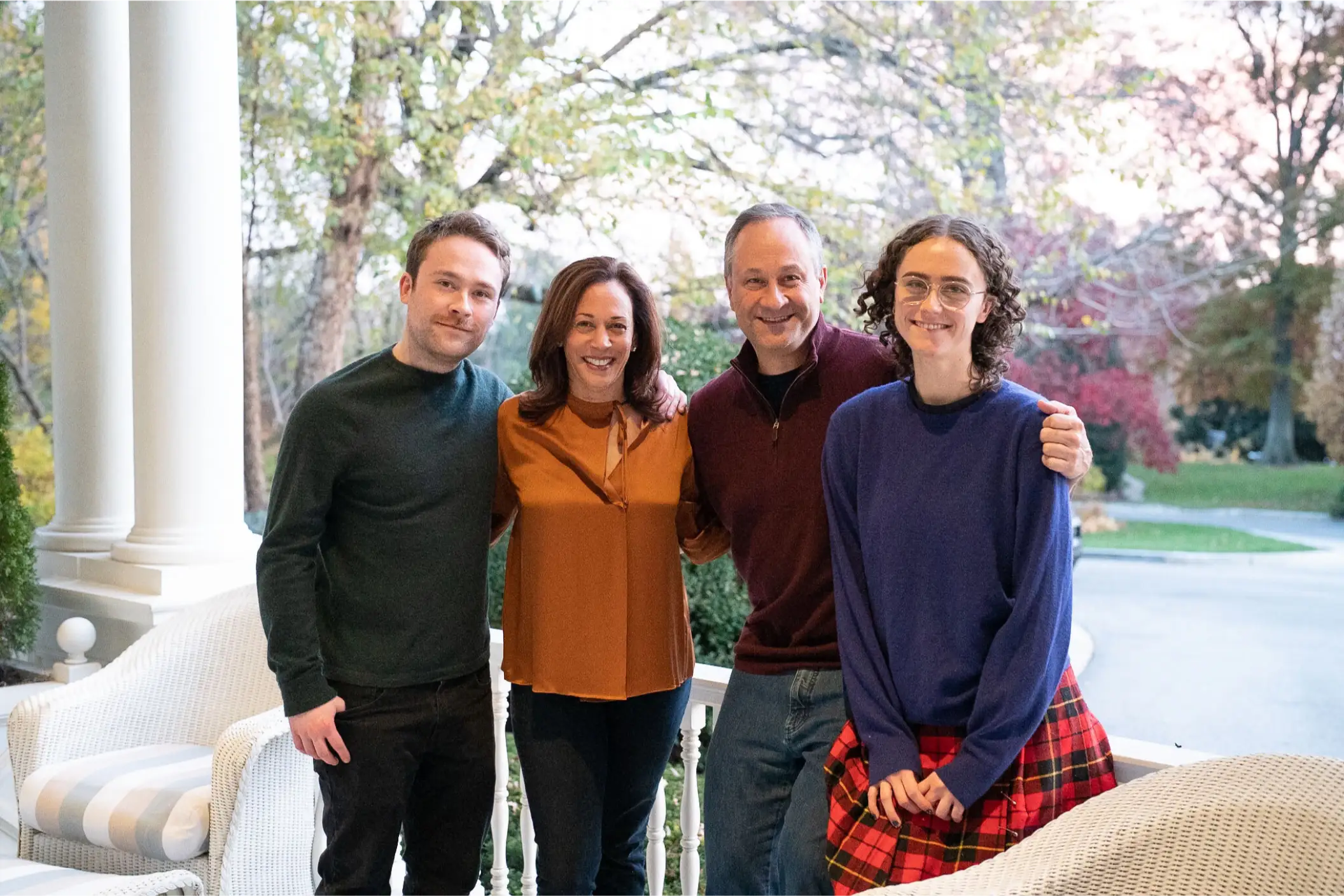 Harris smiles with her husband and children