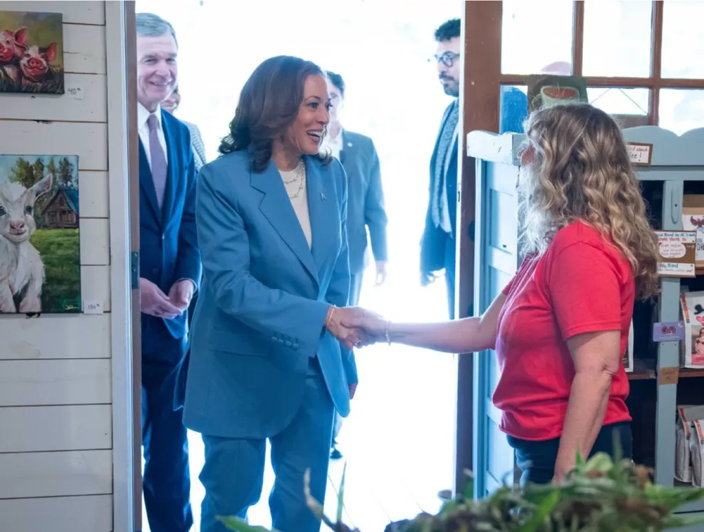 Vice President Harris greats a store employee