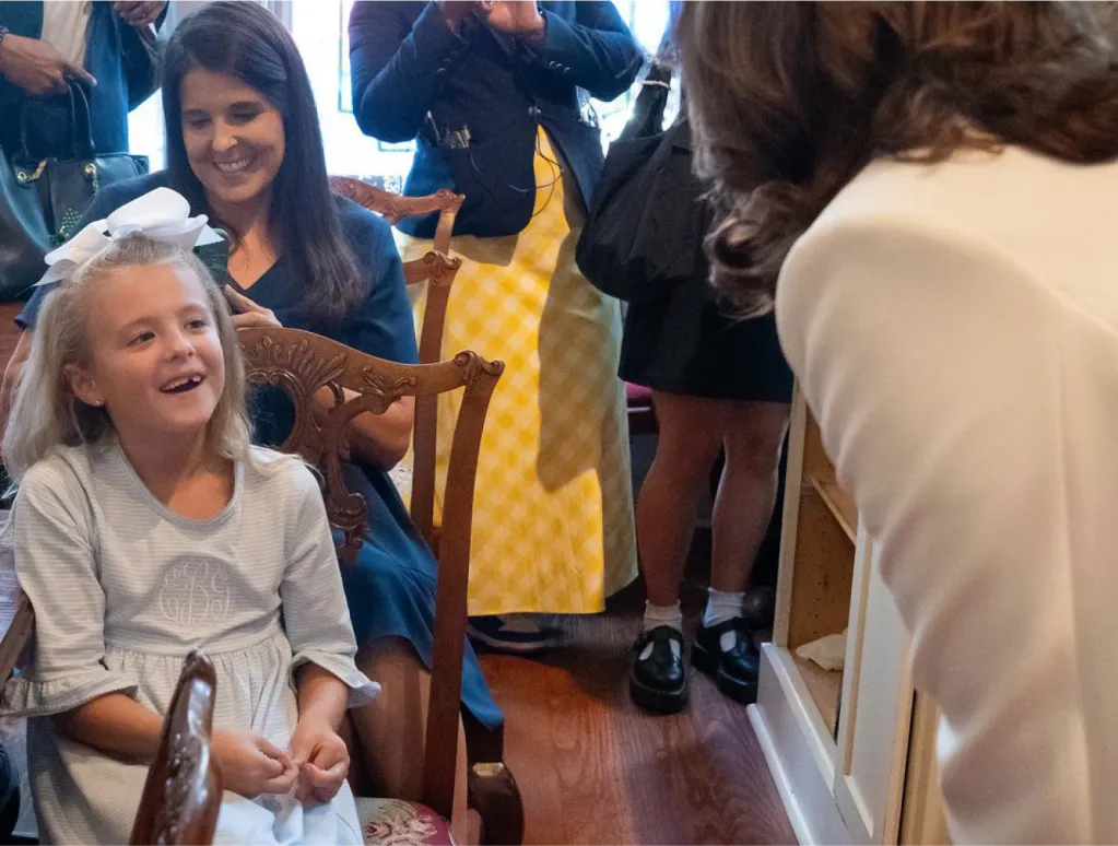 Vice President Harris greets a little girl